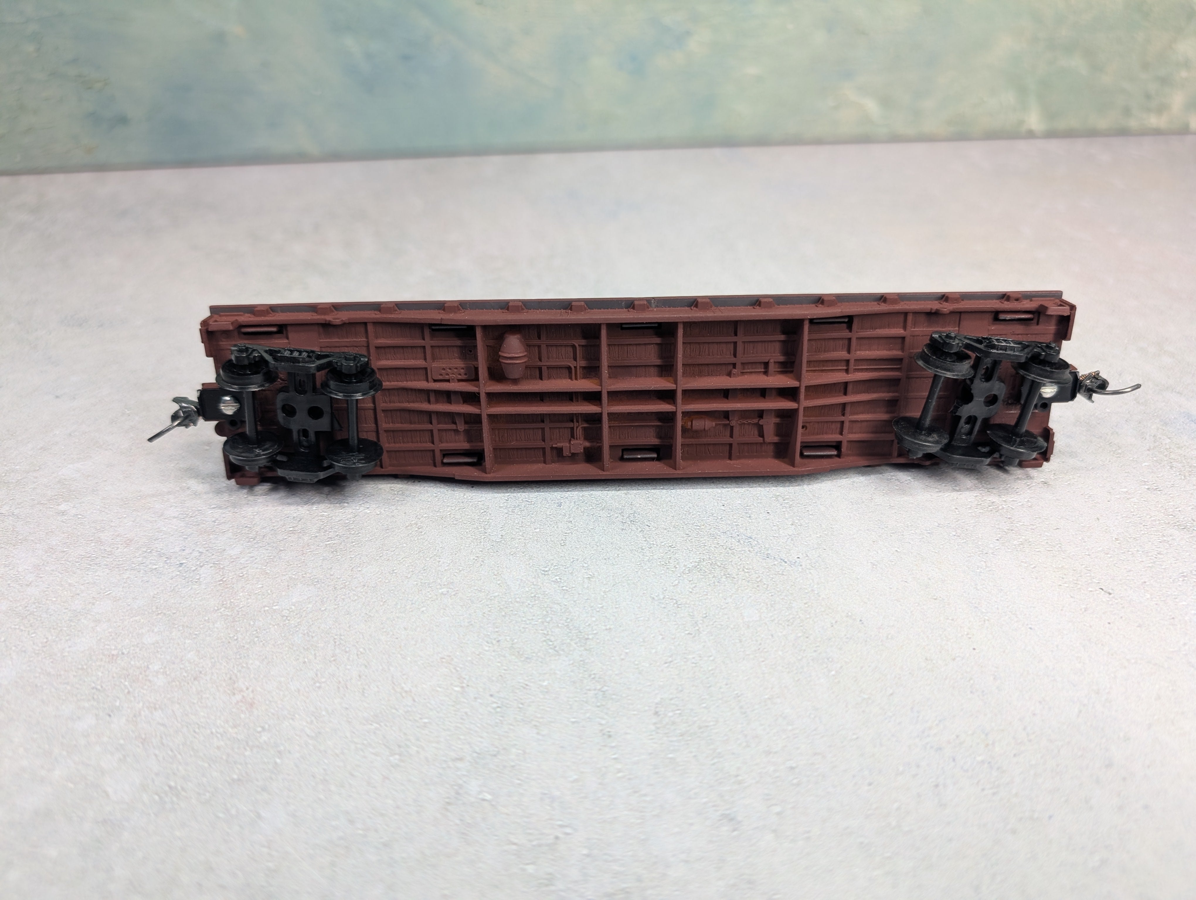 USED Life-Like HO Scale 50' Flat Car Unlettered Brown w/ Pipe Load Custom Weathered