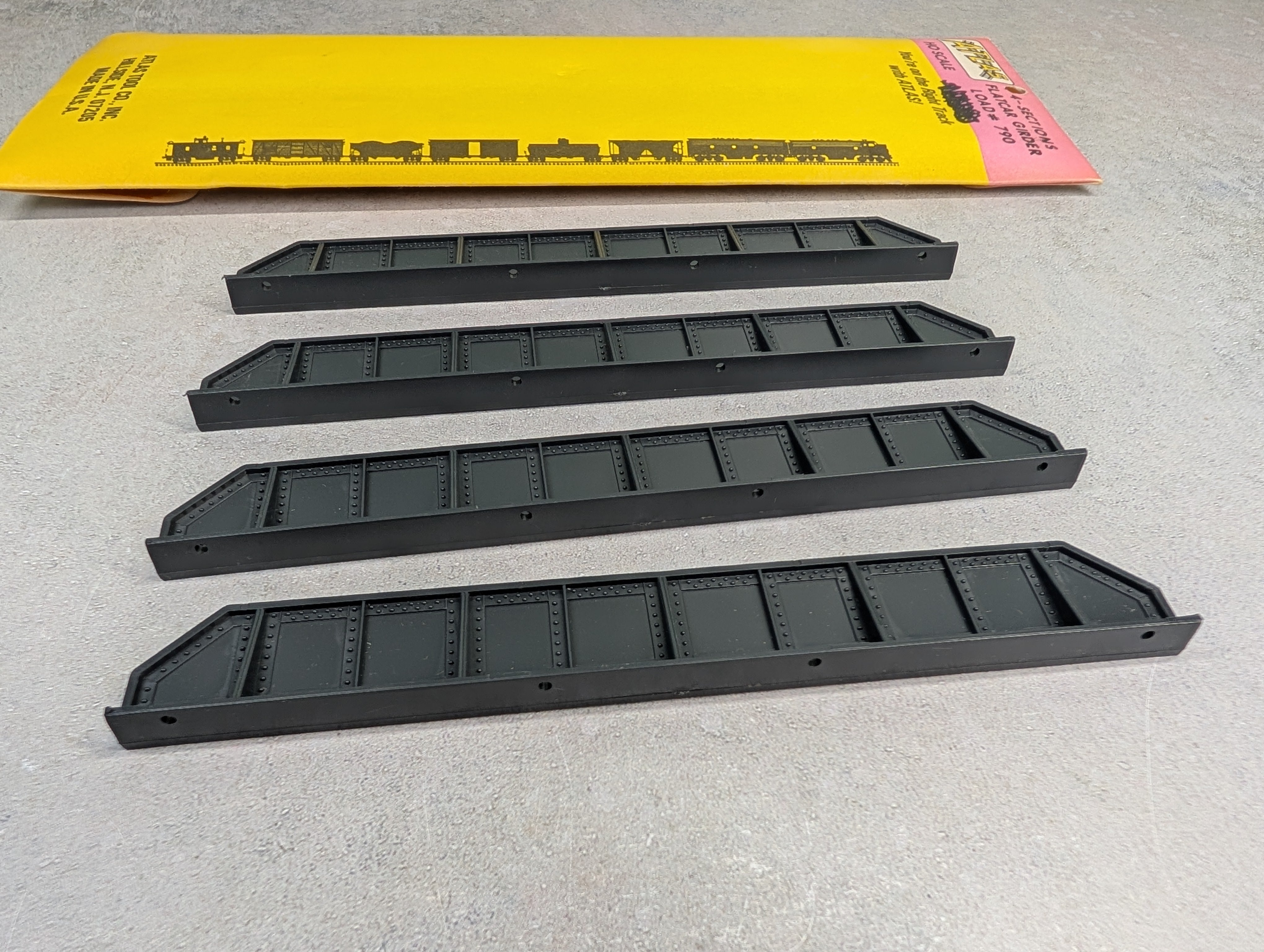 USED Atlas 790 HO Scale 4 Sections of Flatcar Girder Bridge Loads - Pink Pack