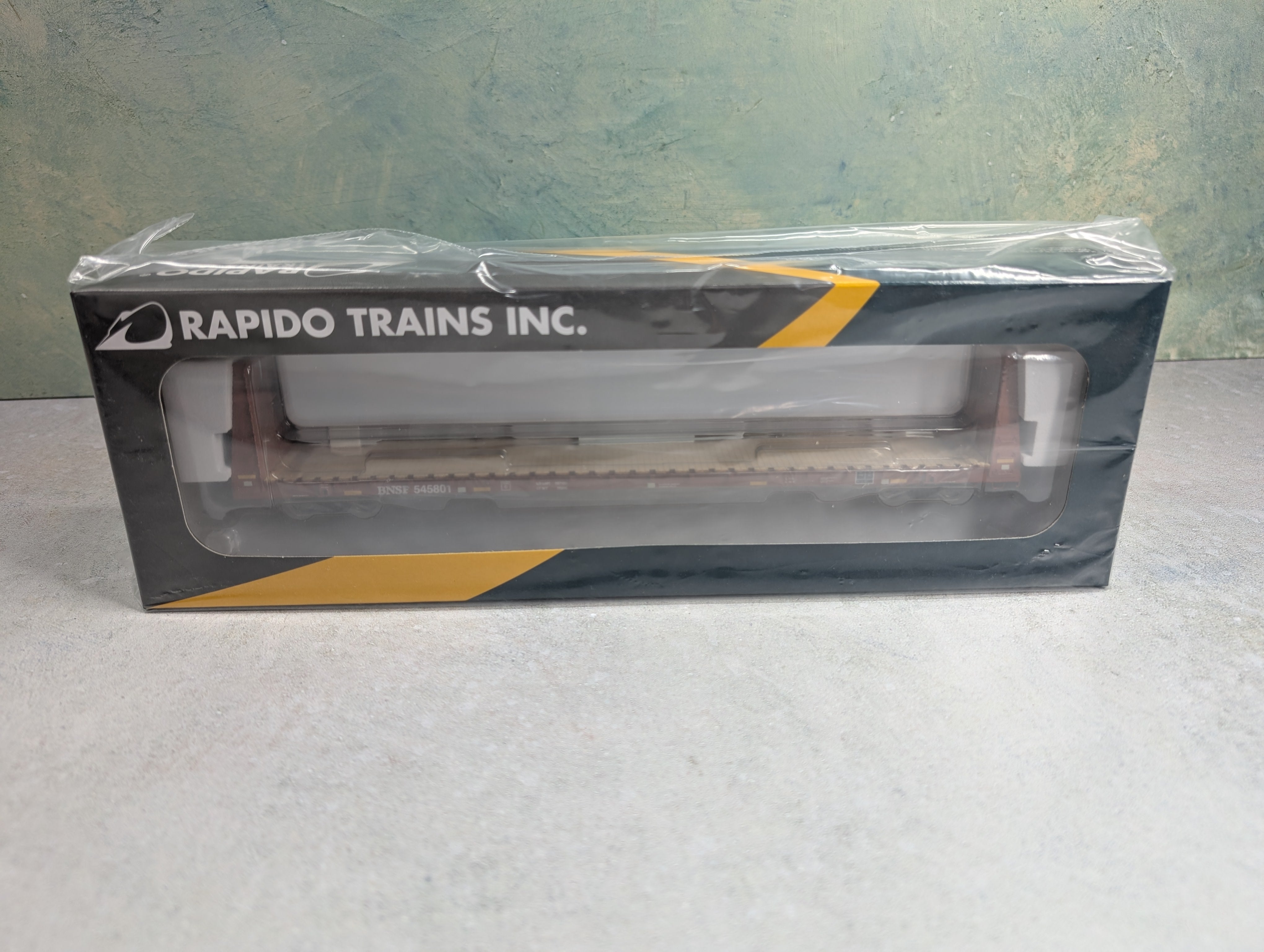 Rapido 147008 HO Scale Bulkhead Flatcar BNSF #545801 Mineral Brown