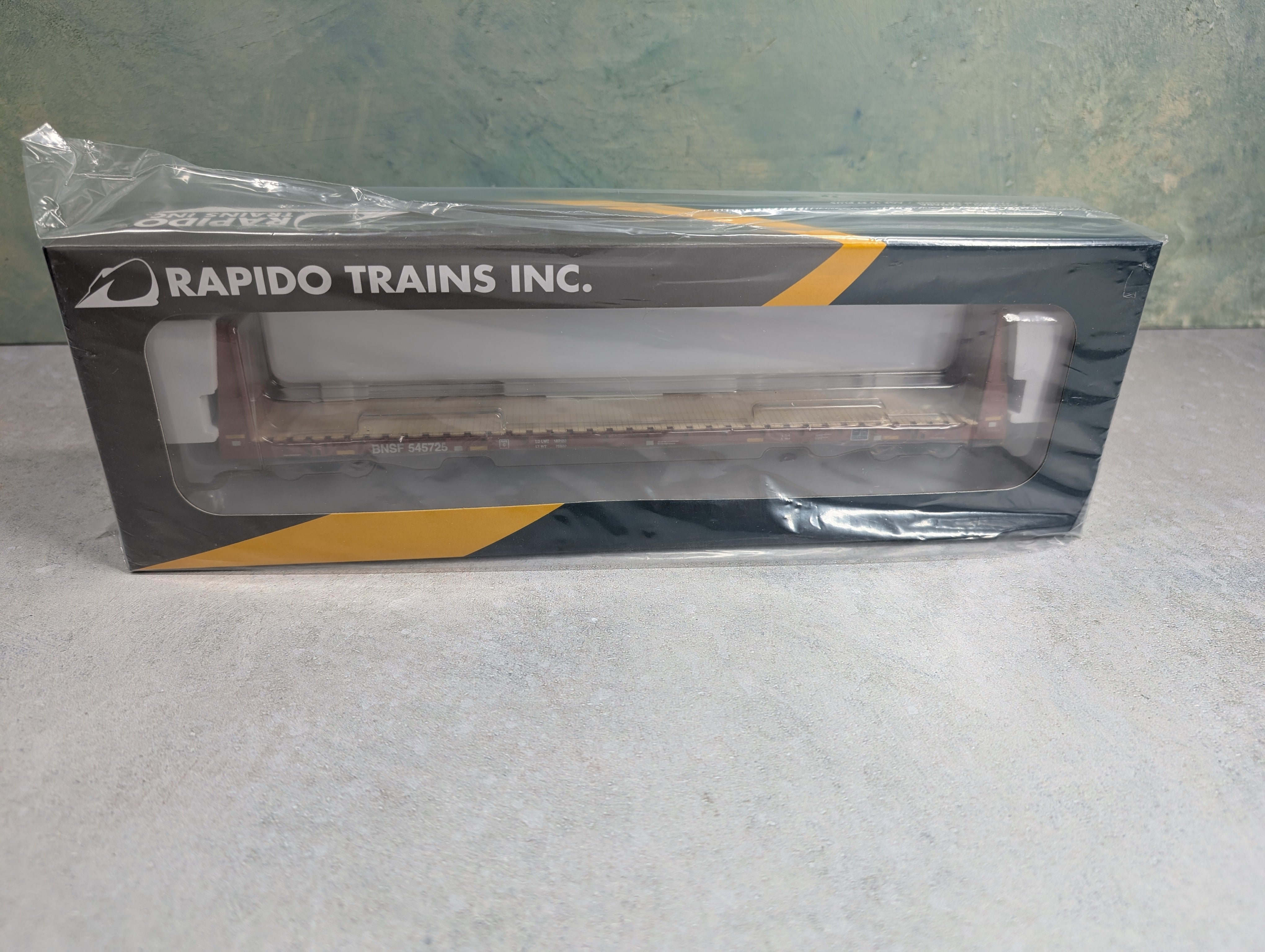 Rapido 147008 HO Scale Bulkhead Flatcar BNSF #545725 Mineral Brown