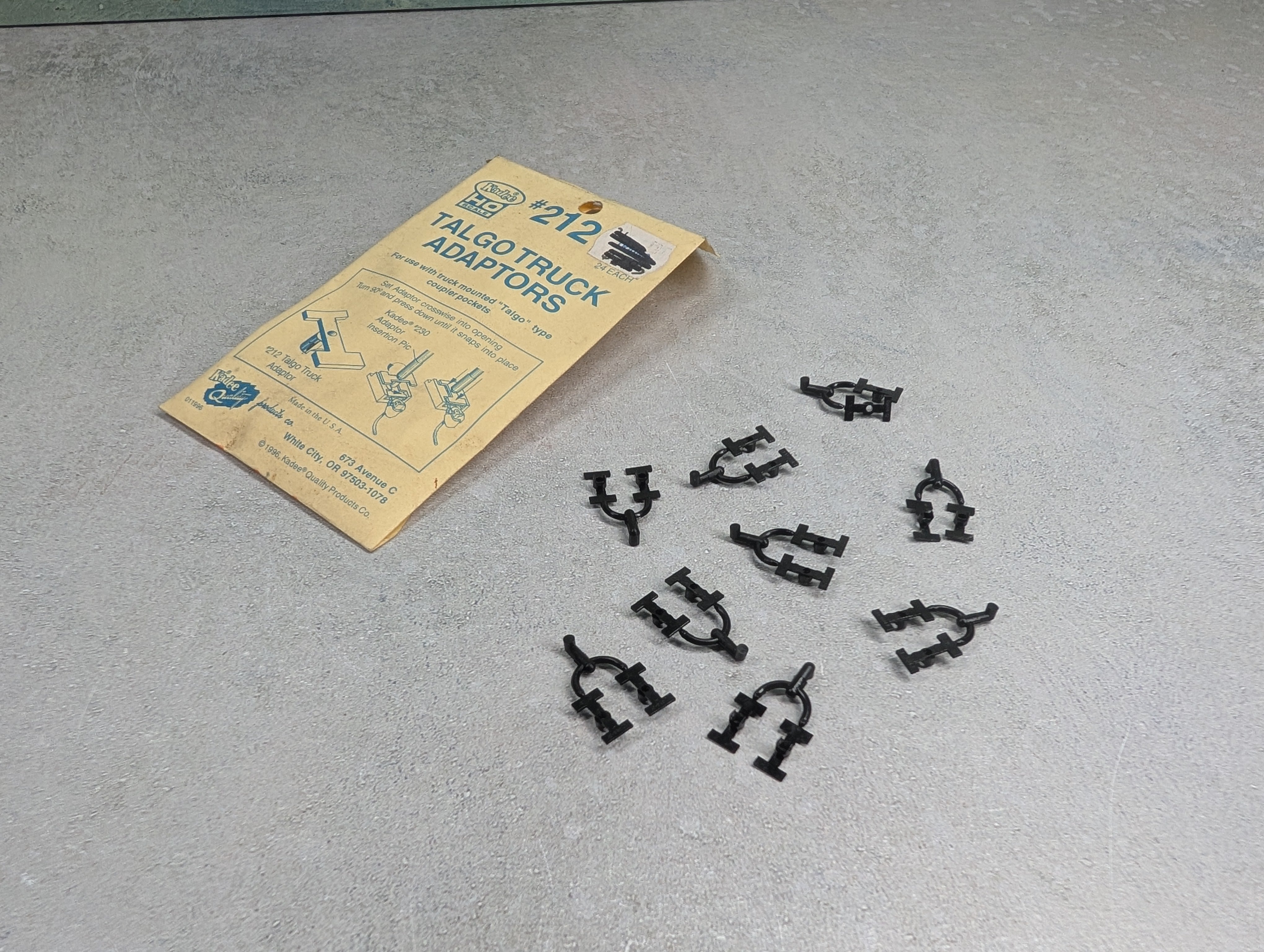 USED Kadee 212 HO Scale Talgo Truck Adaptors (Open Pack) (18 pcs)