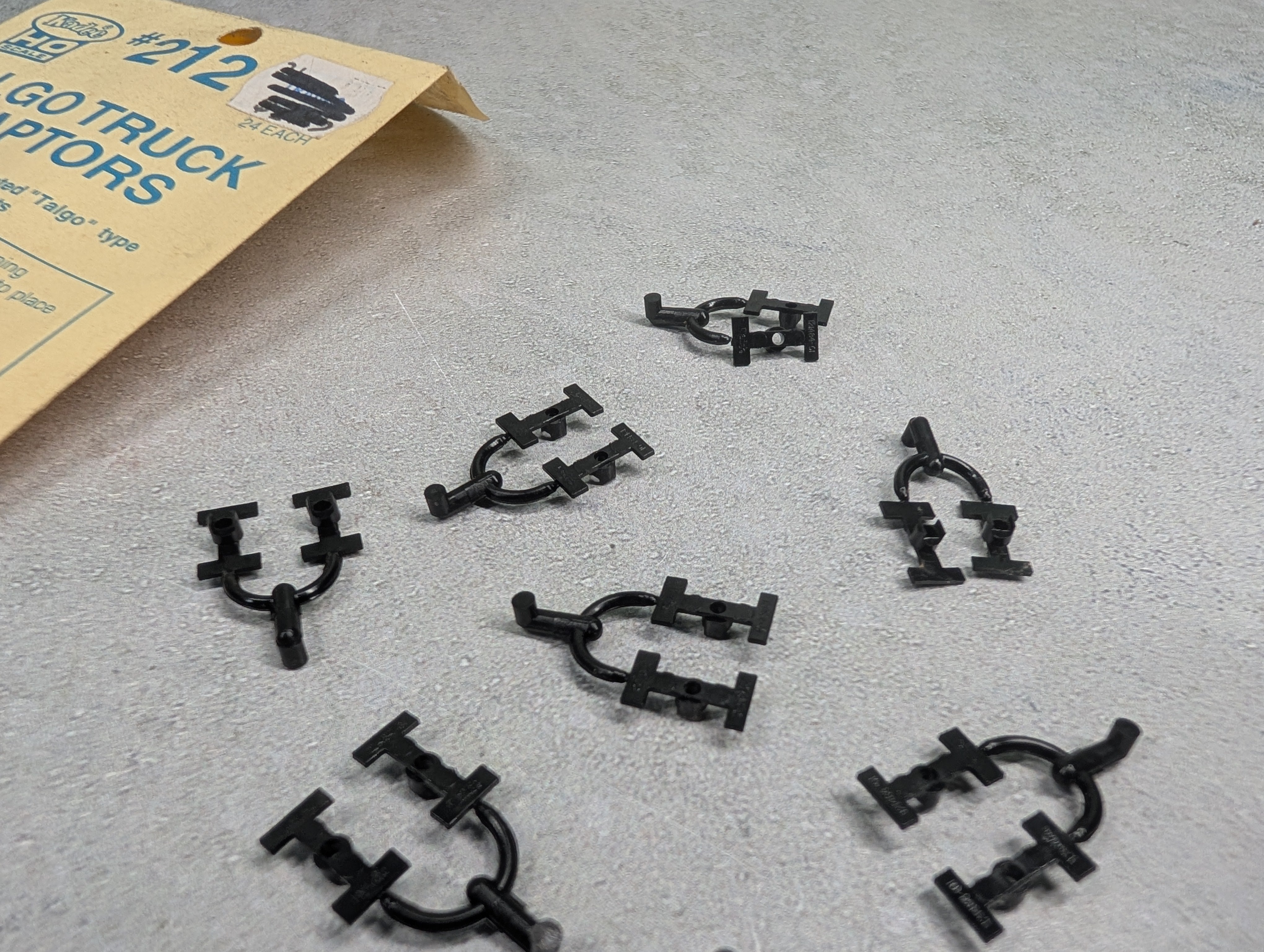 USED Kadee 212 HO Scale Talgo Truck Adaptors (Open Pack) (18 pcs)