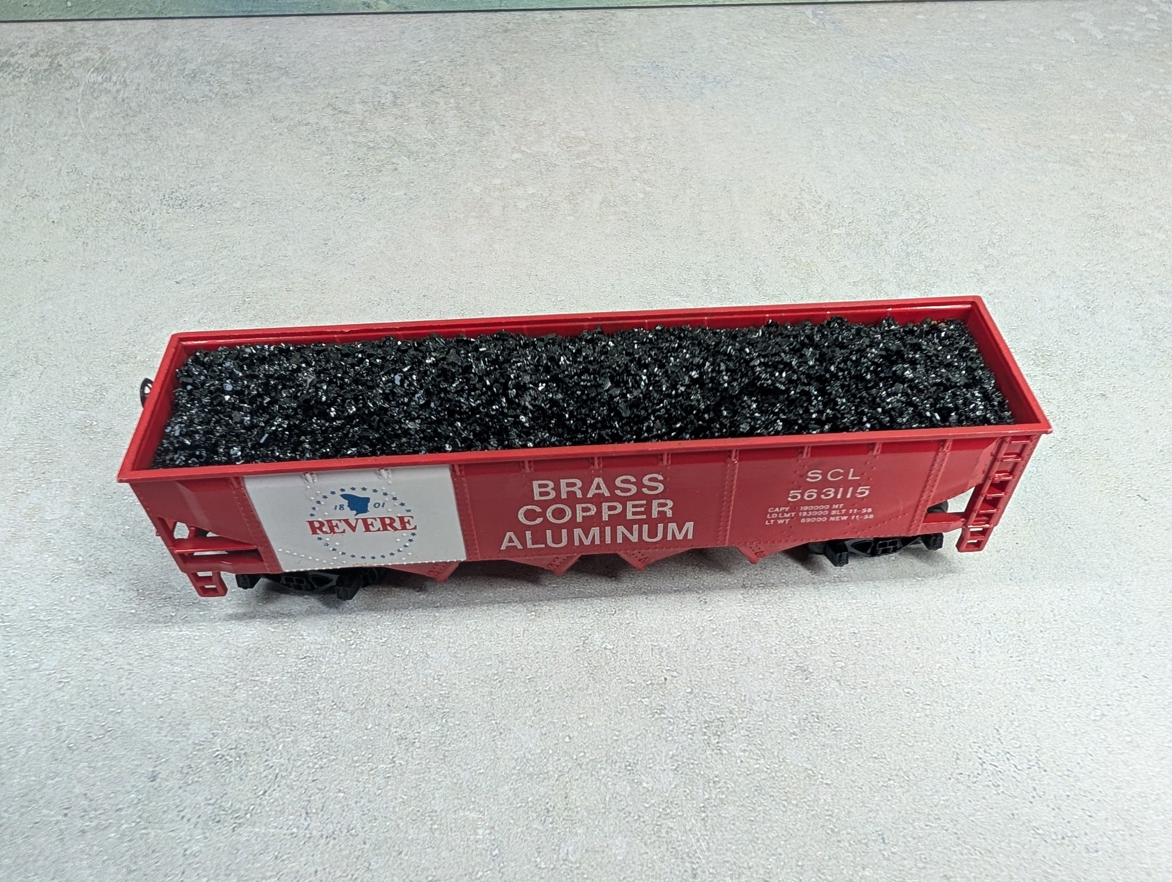 USED Tyco HO Scale Quad Hopper Revere SCL #563115 w/ Load, Brass Copper Aluminum