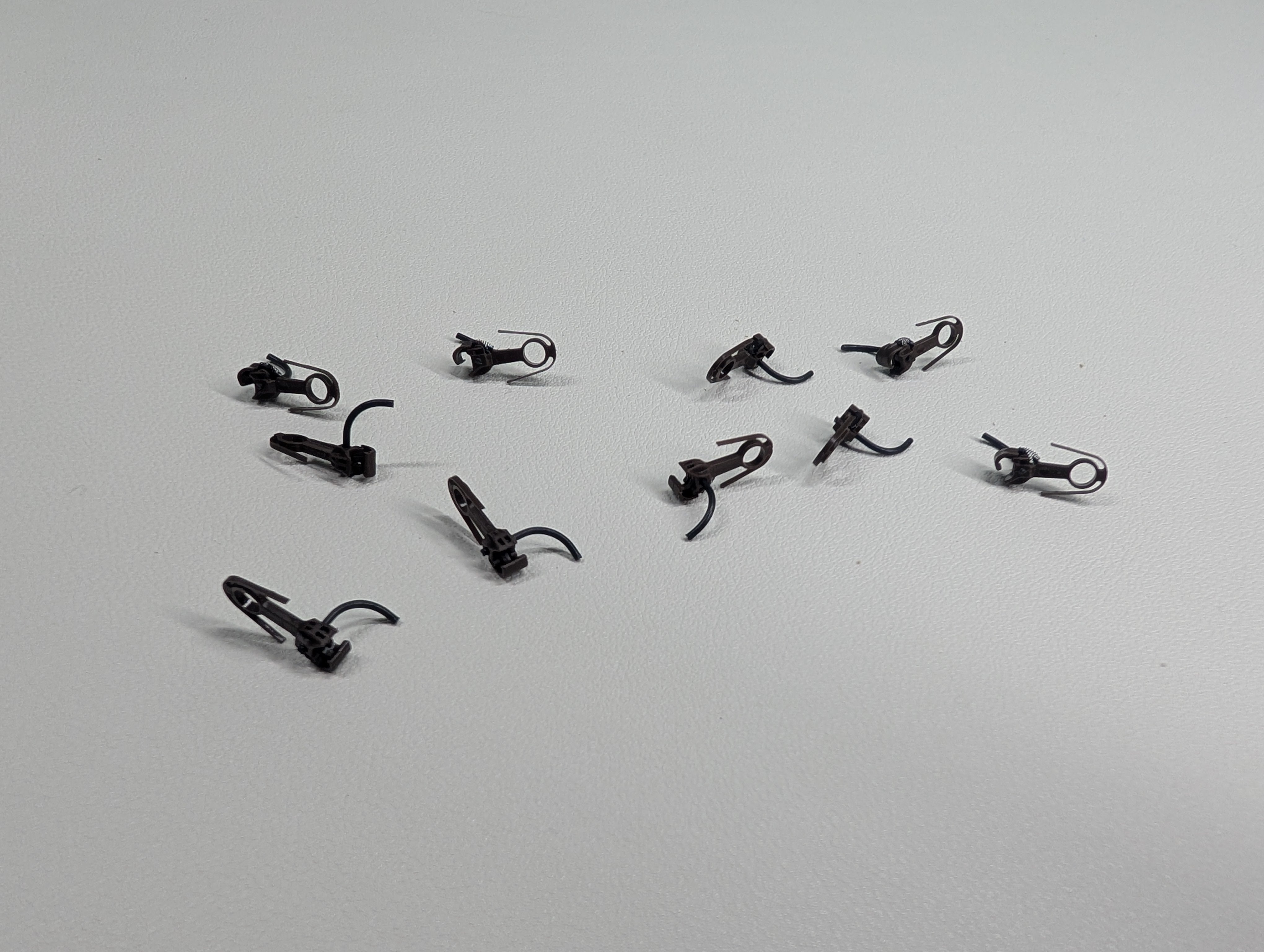 USED HO Scale Scale Rust Colored Self-Centering Plastic Knuckle Coupler (10 pcs)