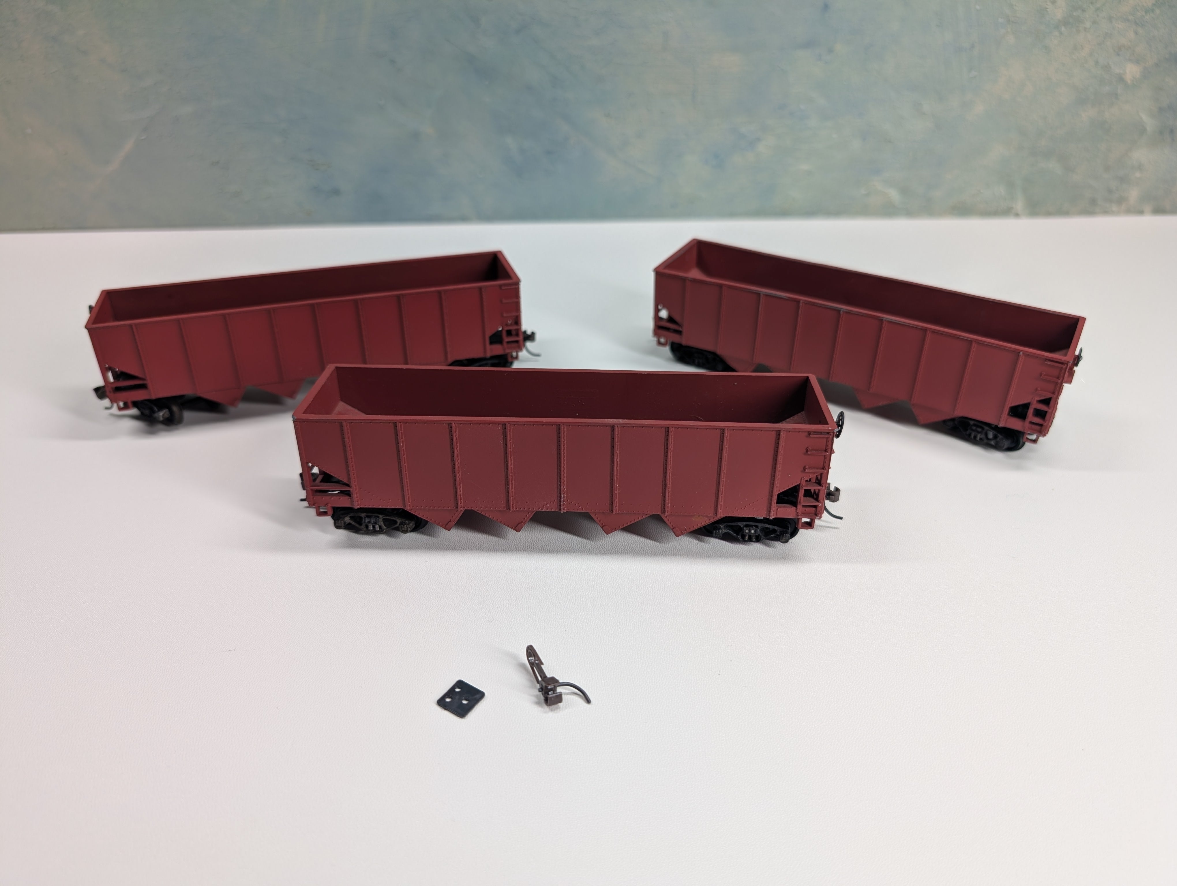USED HO Scale Undecorated Tuscan Red Quad Hoppers (3 pcs)