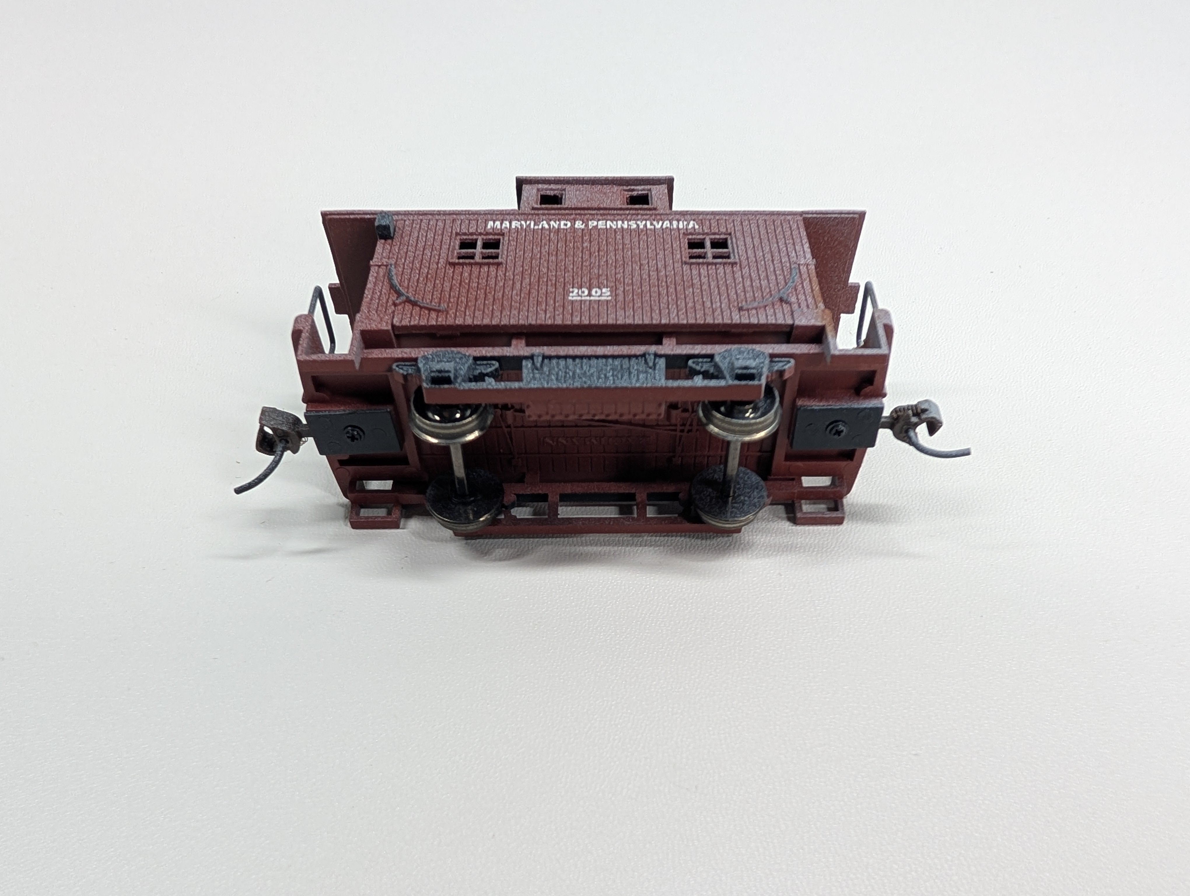 USED HO Scale Bobber Caboose w/ Figure Maryland & Pennsylvania #2005 Weathered