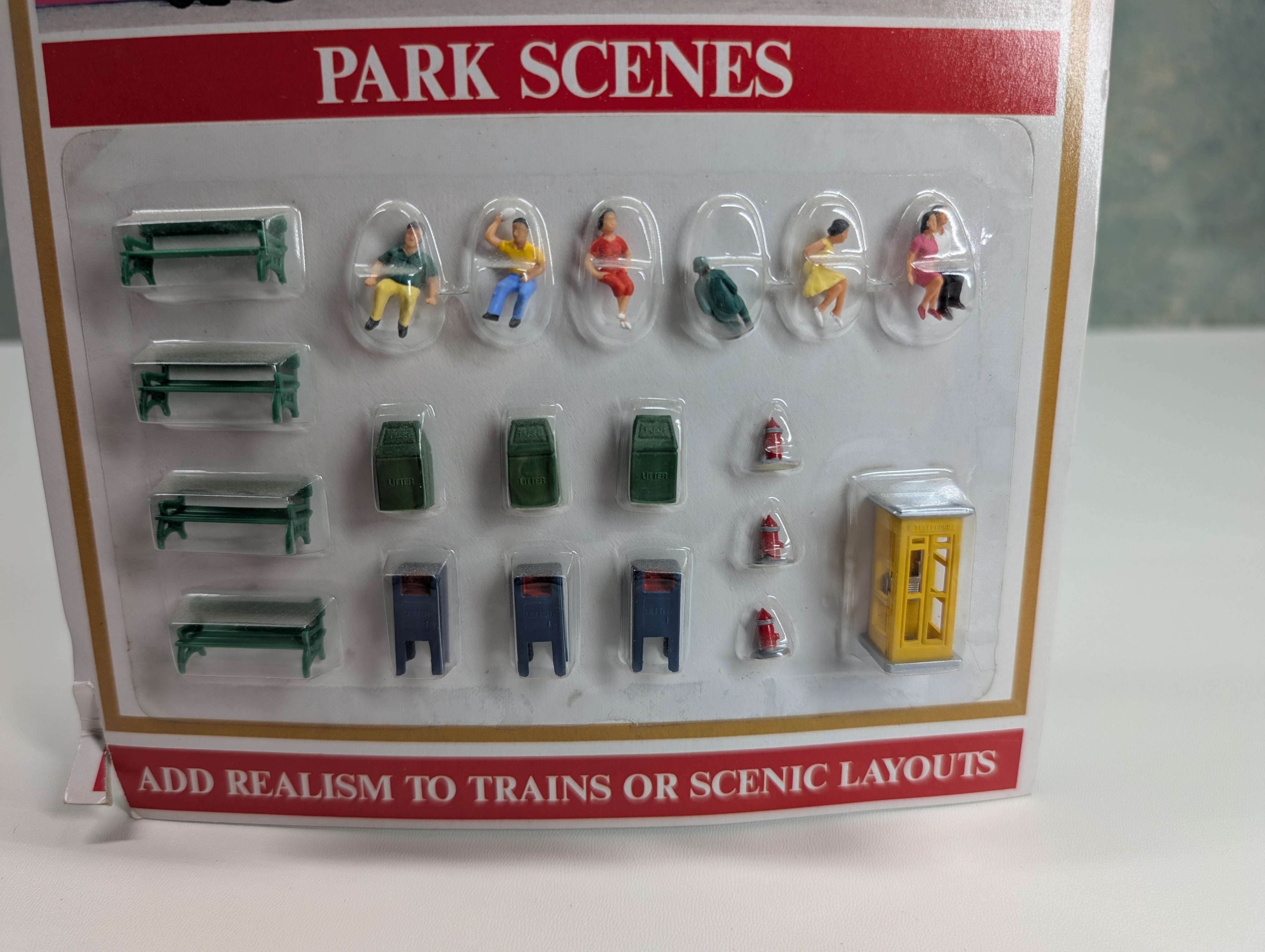 Model Power 5710 HO Scale Pack Scene with People, Benches and more (20 pcs)