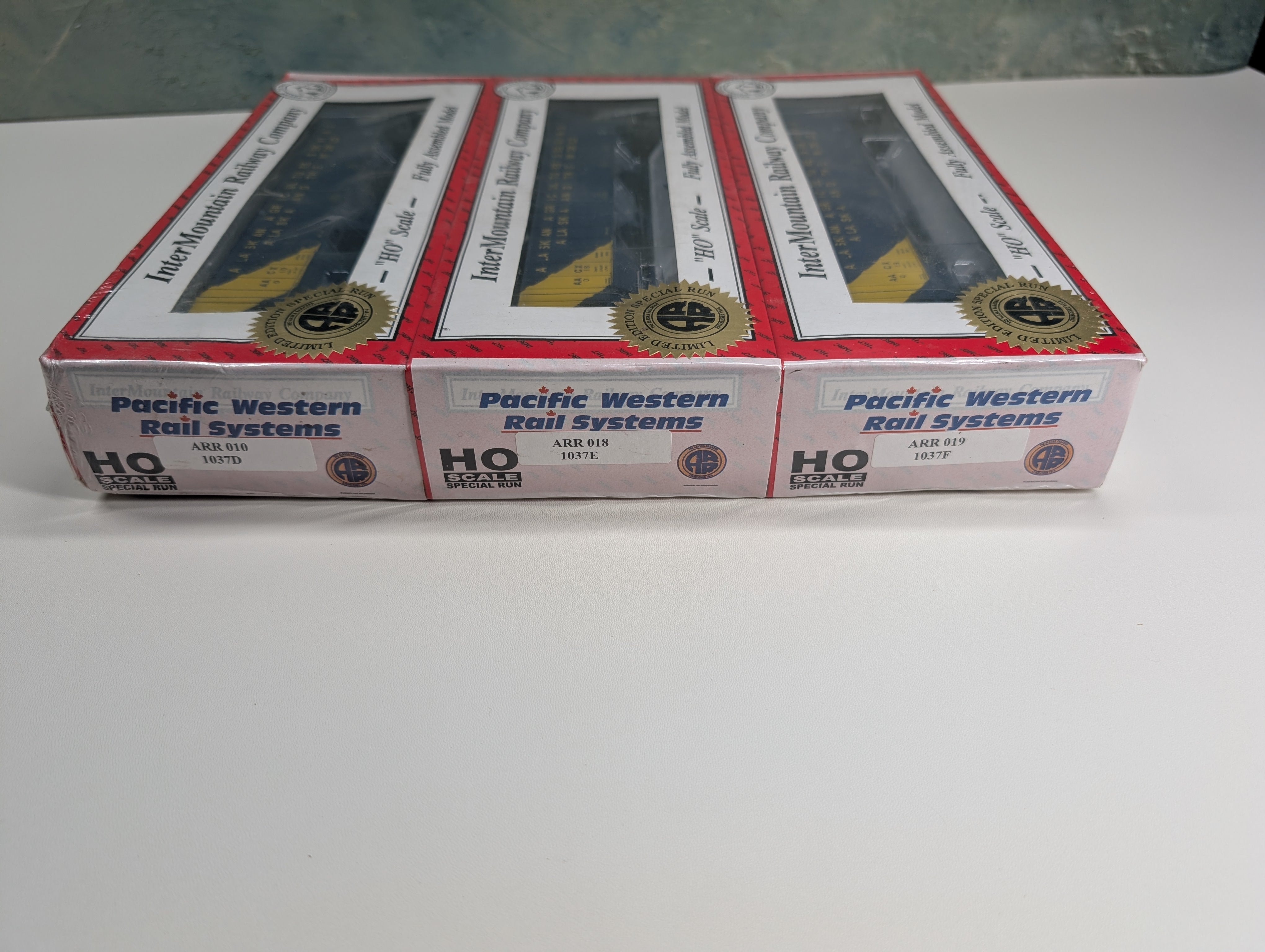 Intermountain 1037-3B HO Scale 4750 cu. ft. 18 Ribbed 3 Bay Hopper Set Alaska AACX #Road #s 010, 018, 019 PWRS Special Run (3 pcs)