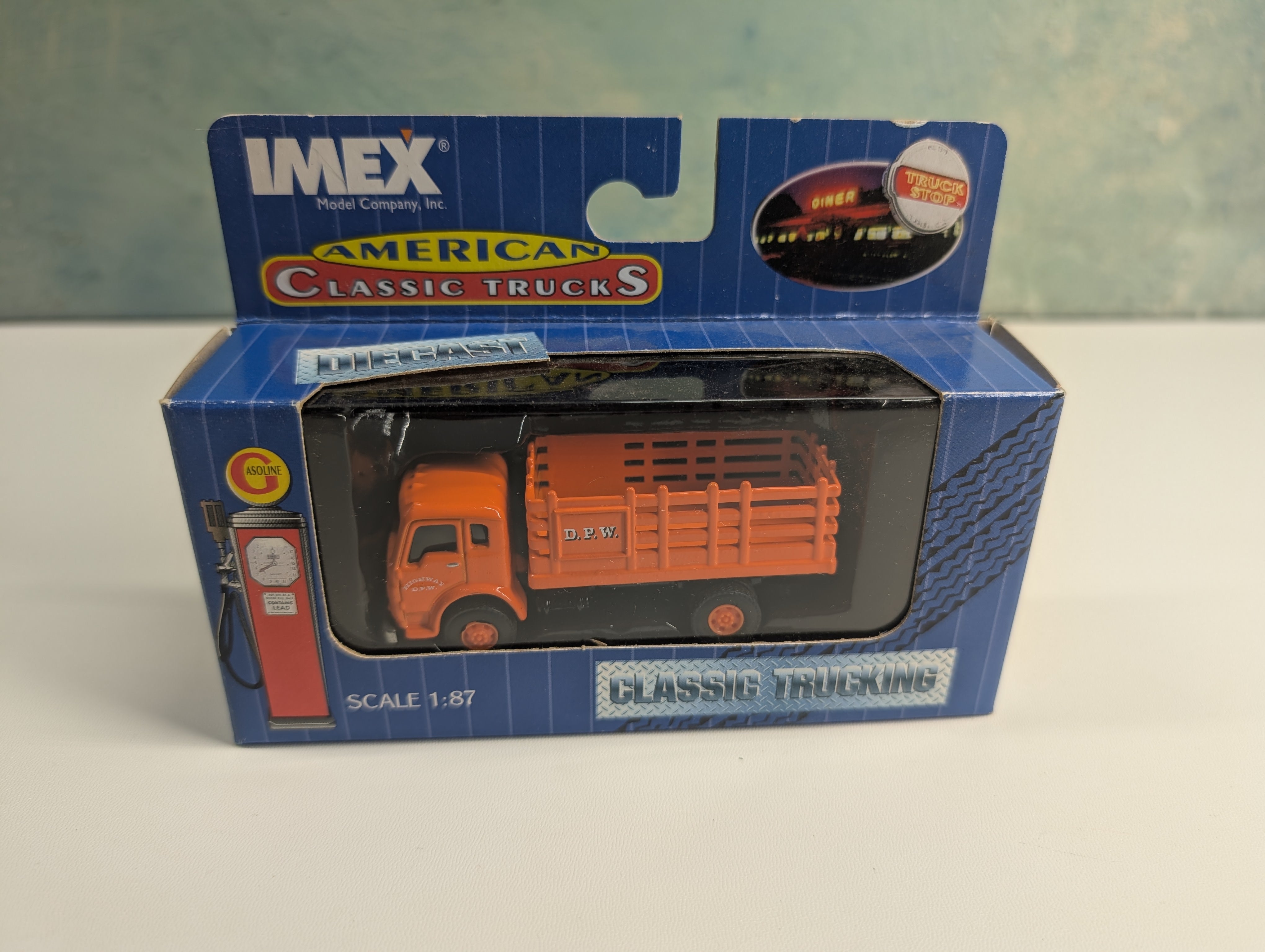 Imex 870189 HO Scale Orange DPW Stake Truck