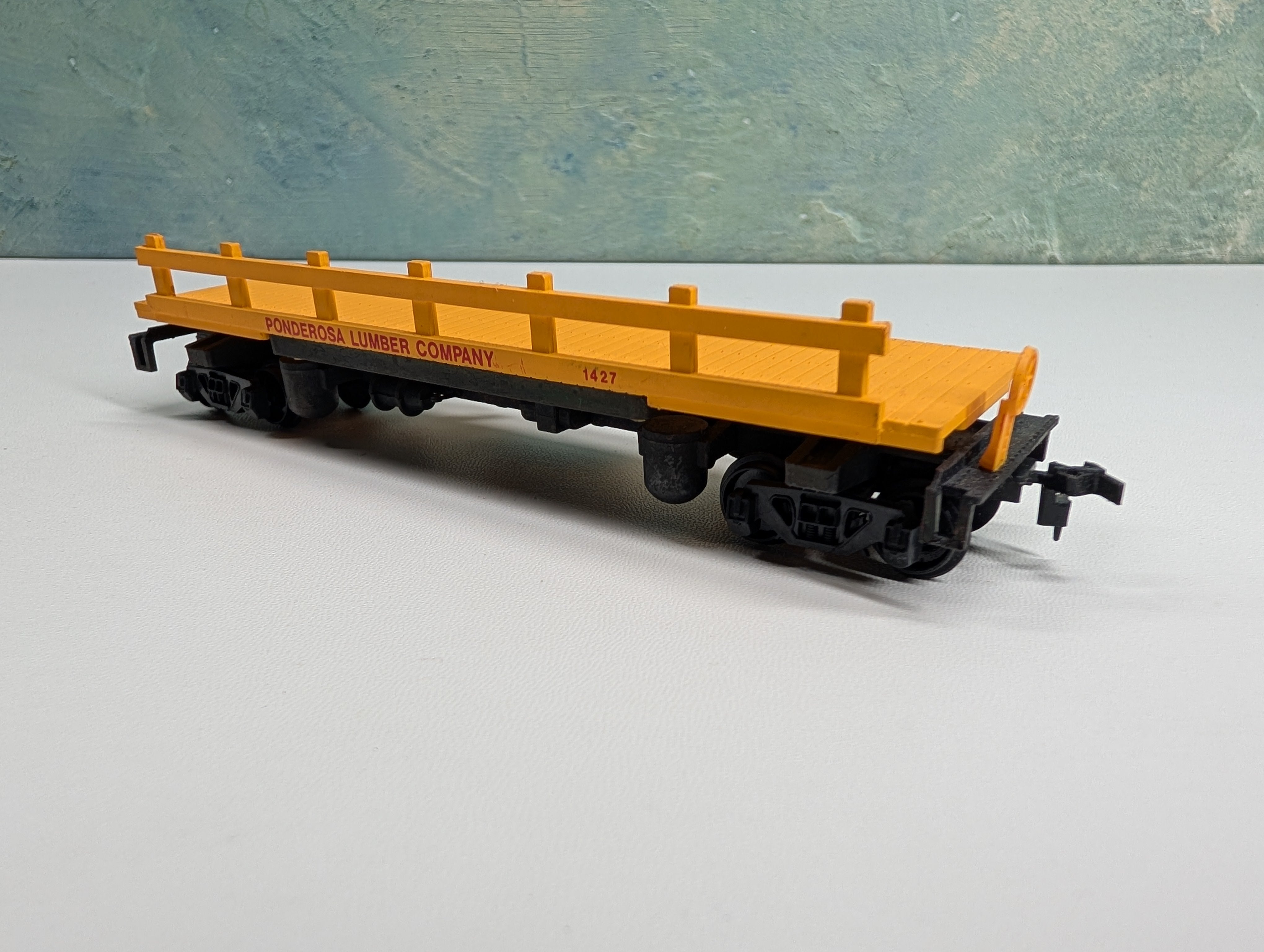 USED Bachmann HO Scale Dump Flat Car Ponderosa Lumber Co #1427