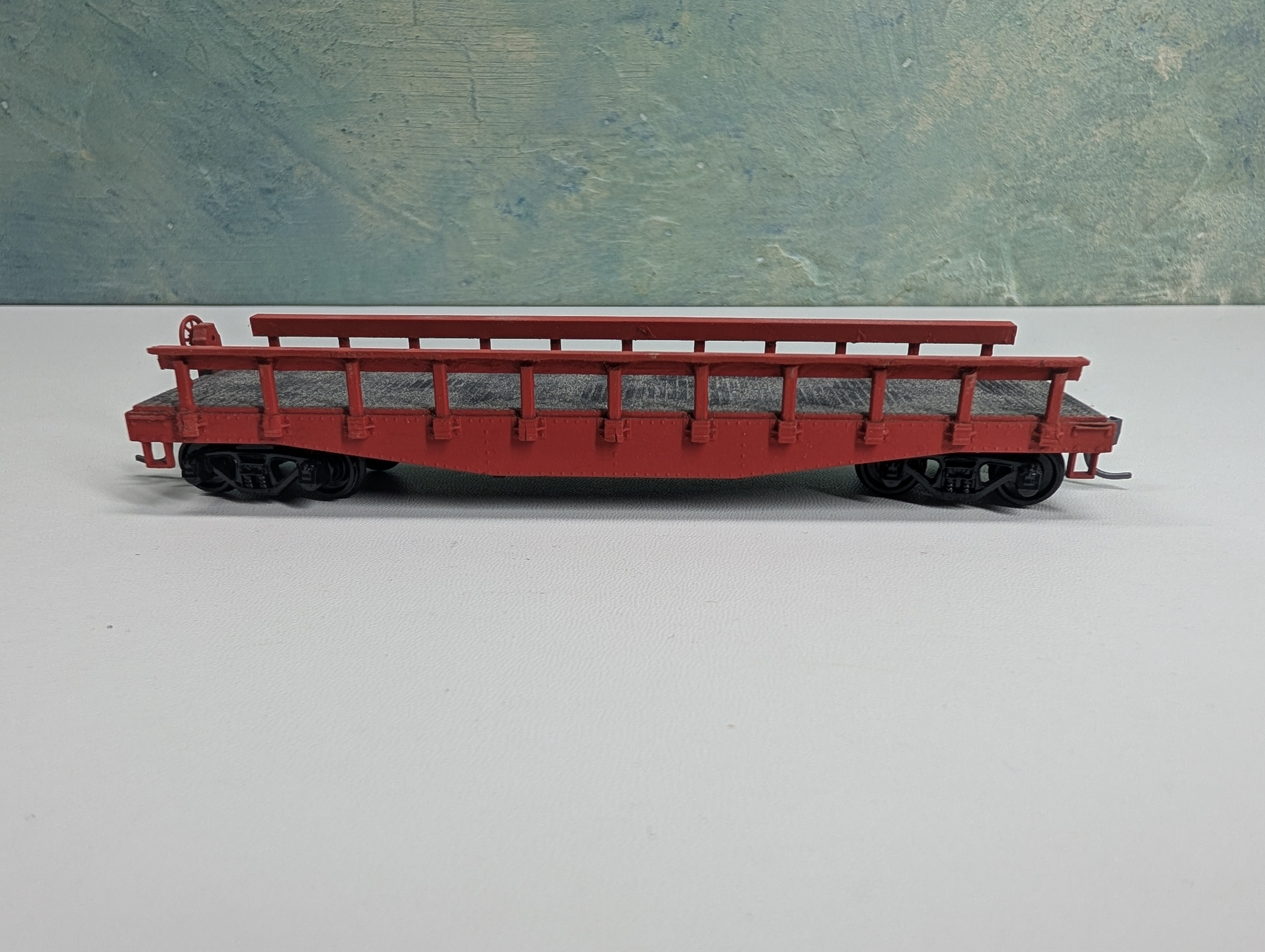 USED Athearn HO Scale Red 40' Flat Car w/ Stakes
