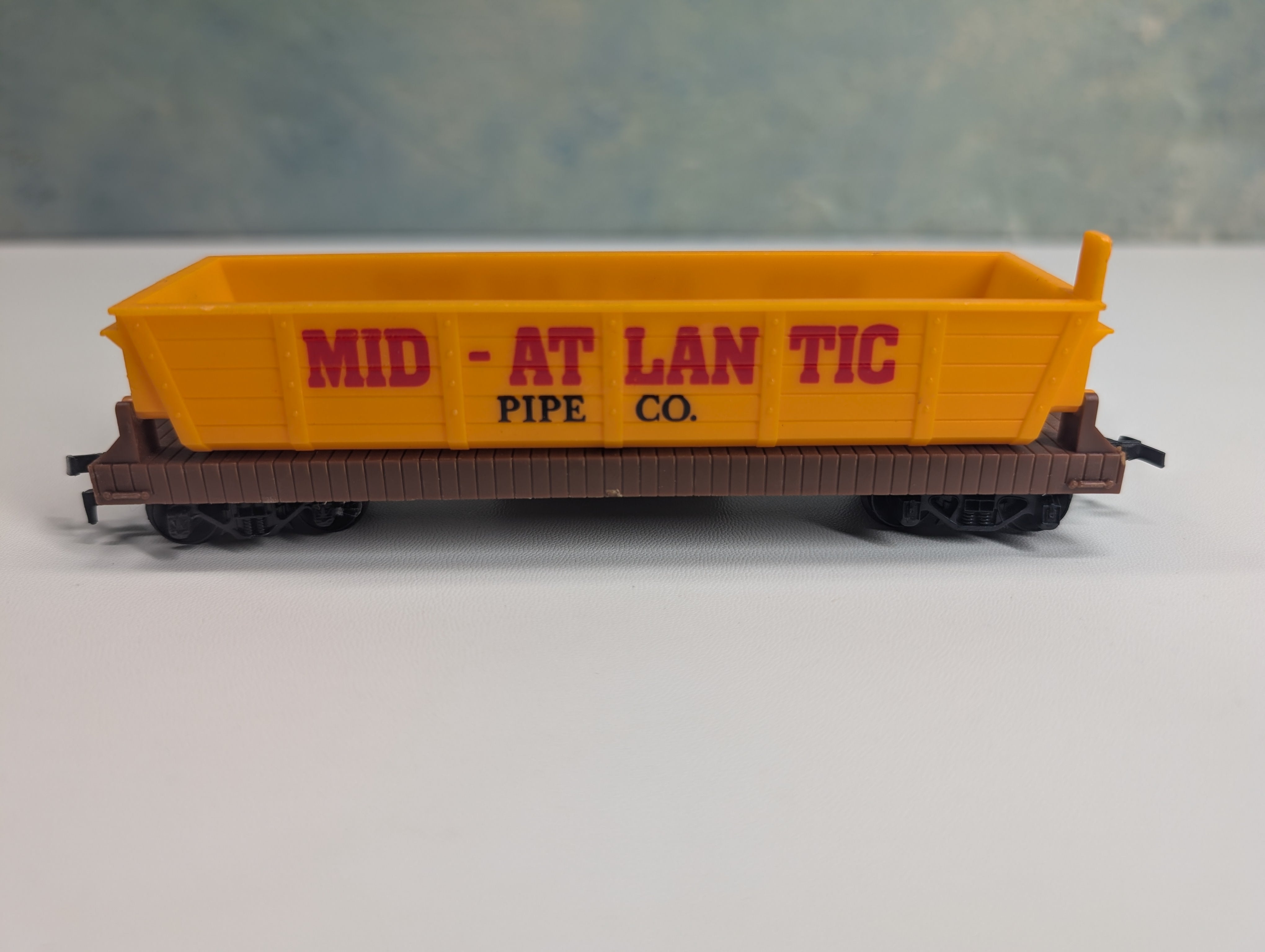 USED Tyco HO Scale Mid-Atlantic Pipe Co Dump Car Gondola