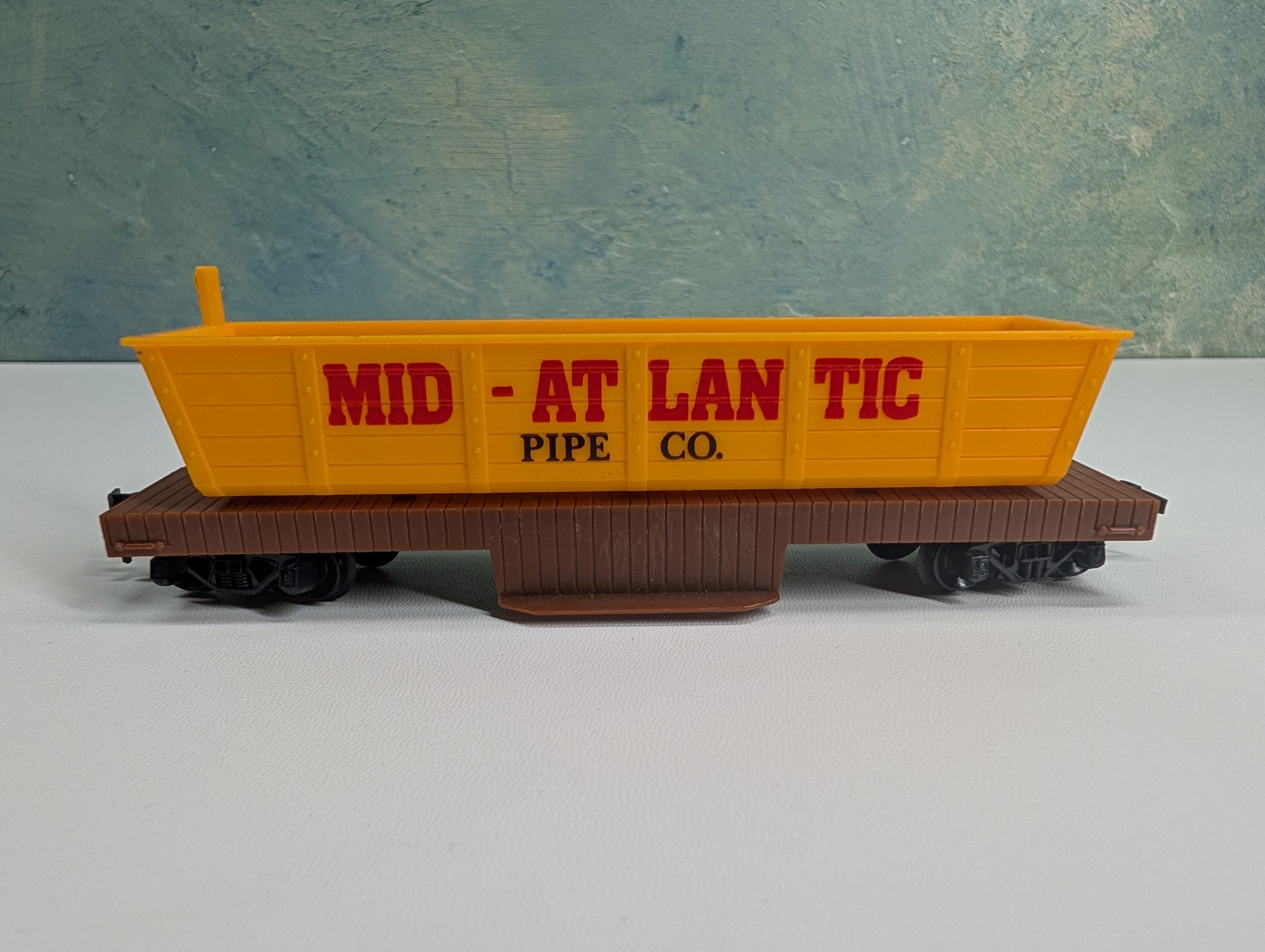 USED Tyco HO Scale Mid-Atlantic Pipe Co Dump Car Gondola