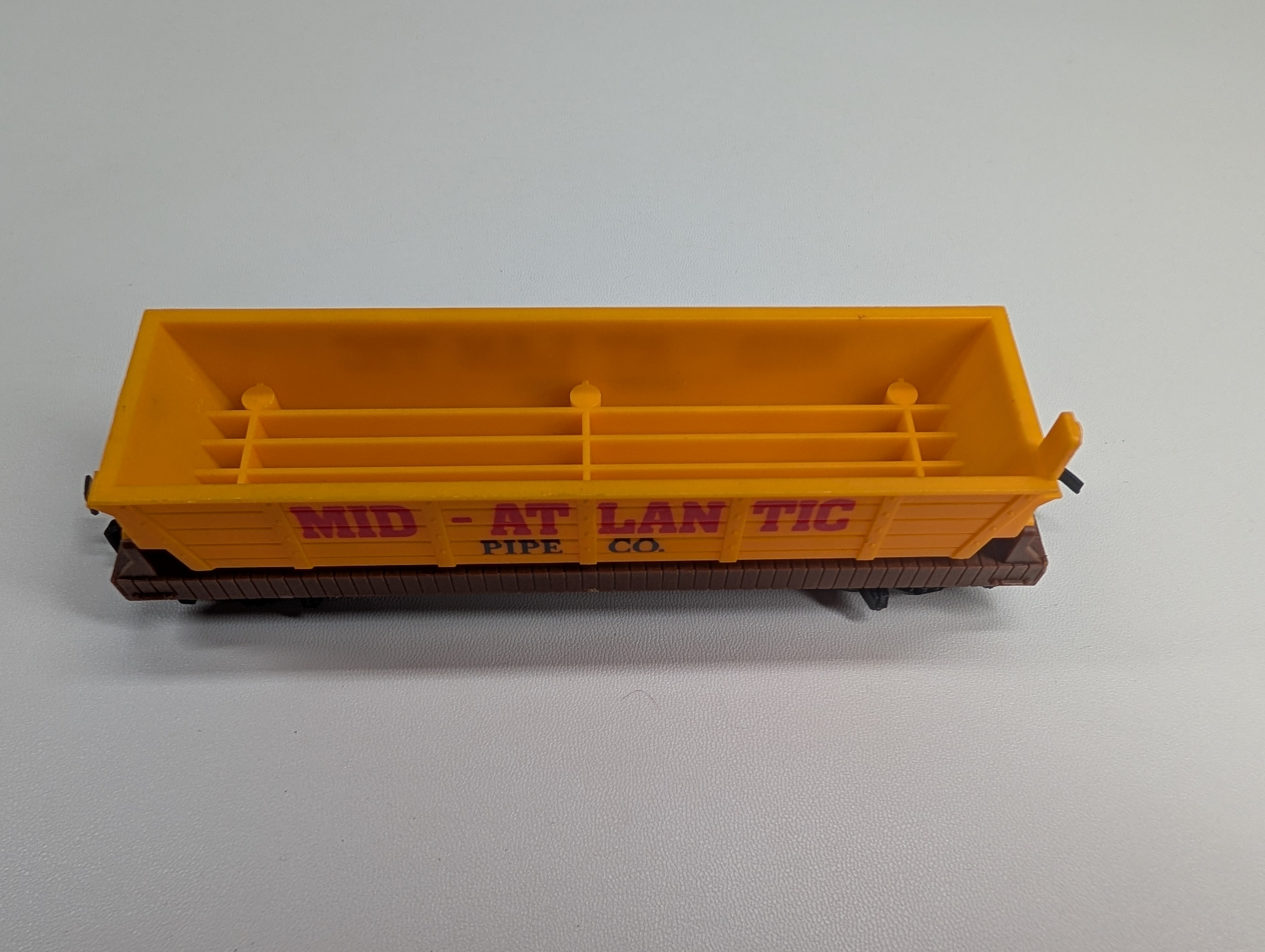 USED Tyco HO Scale Mid-Atlantic Pipe Co Dump Car Gondola