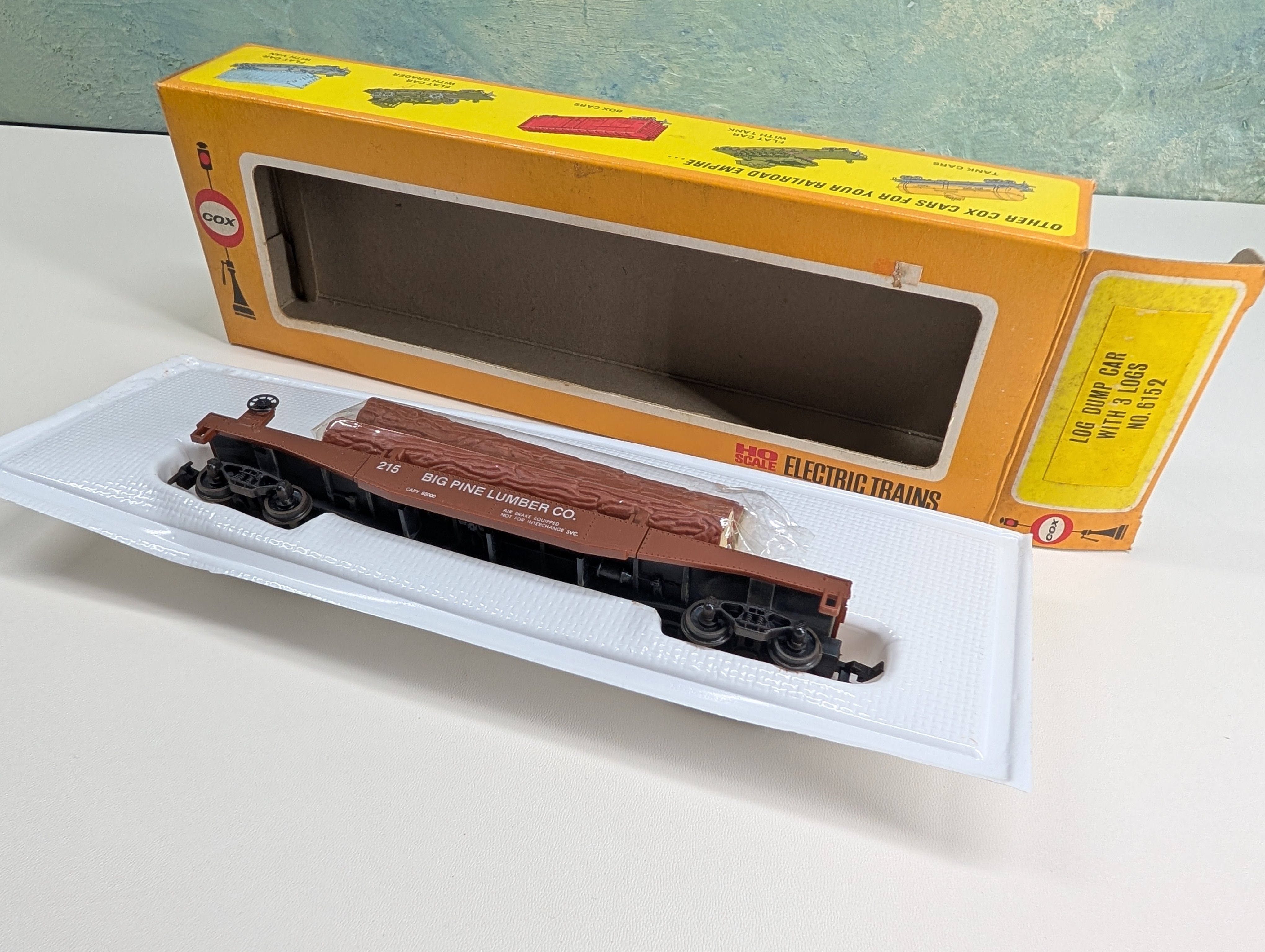 USED Cox 6152 HO Scale Log Dump Car w/ 3 Logs Big Pine Lumber CO #215