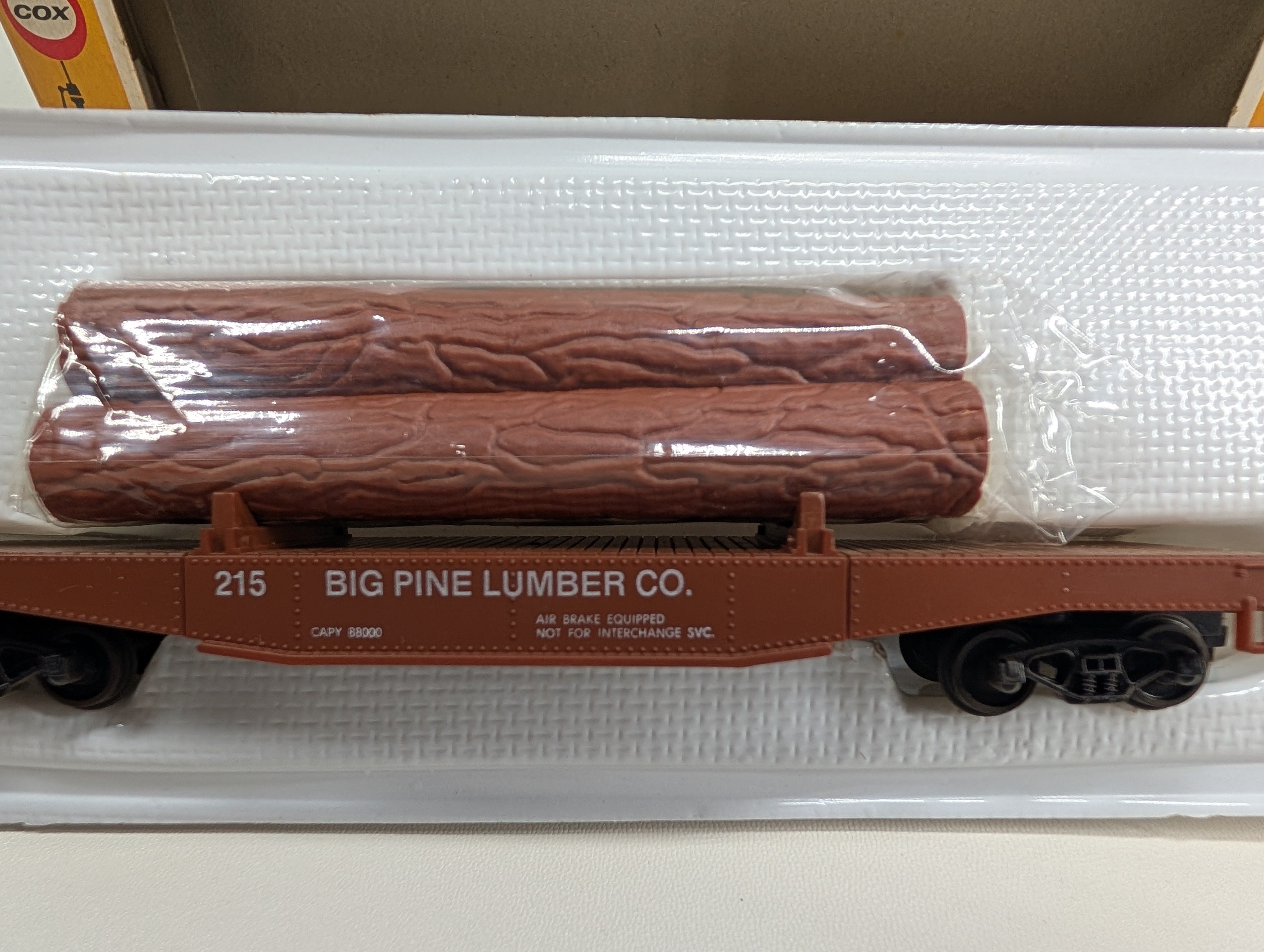 USED Cox 6152 HO Scale Log Dump Car w/ 3 Logs Big Pine Lumber CO #215