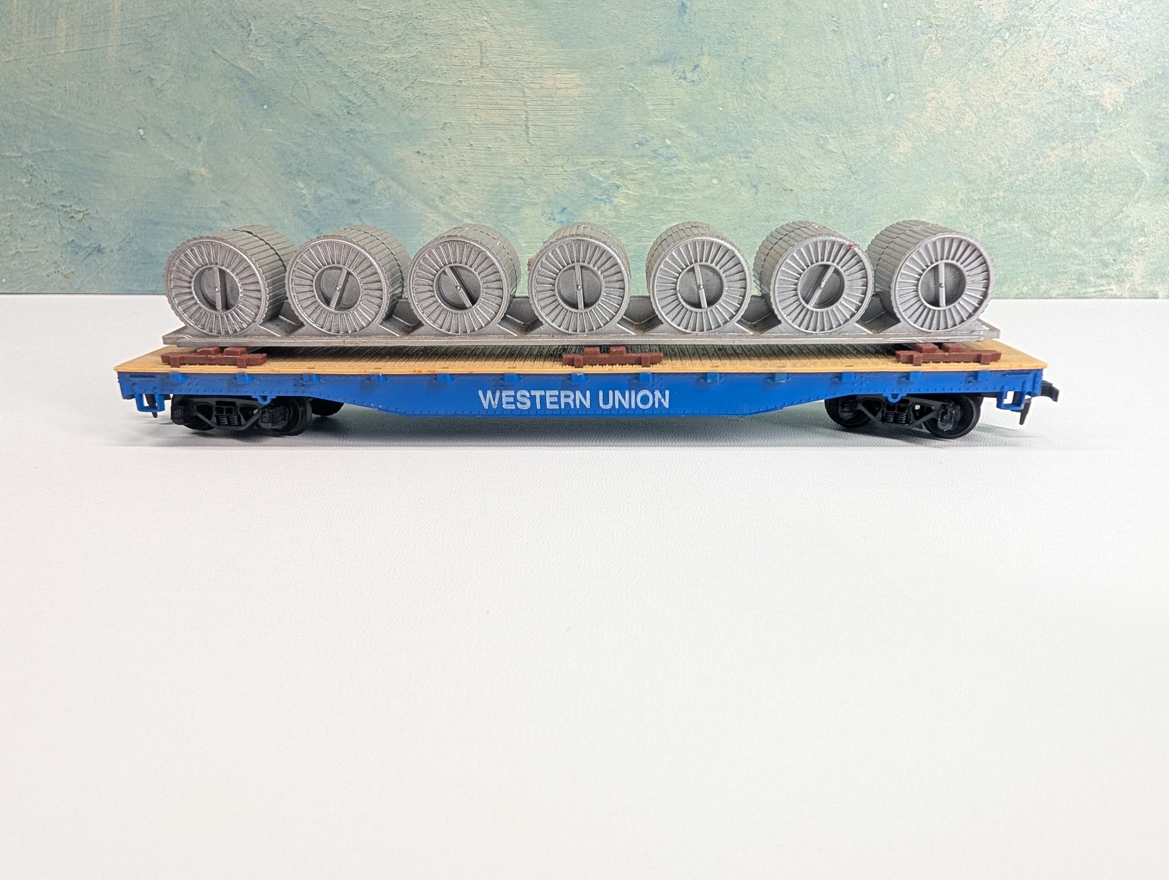 USED Tyco HO Scale 50' Flat Car w/ Coil Load Western Union
