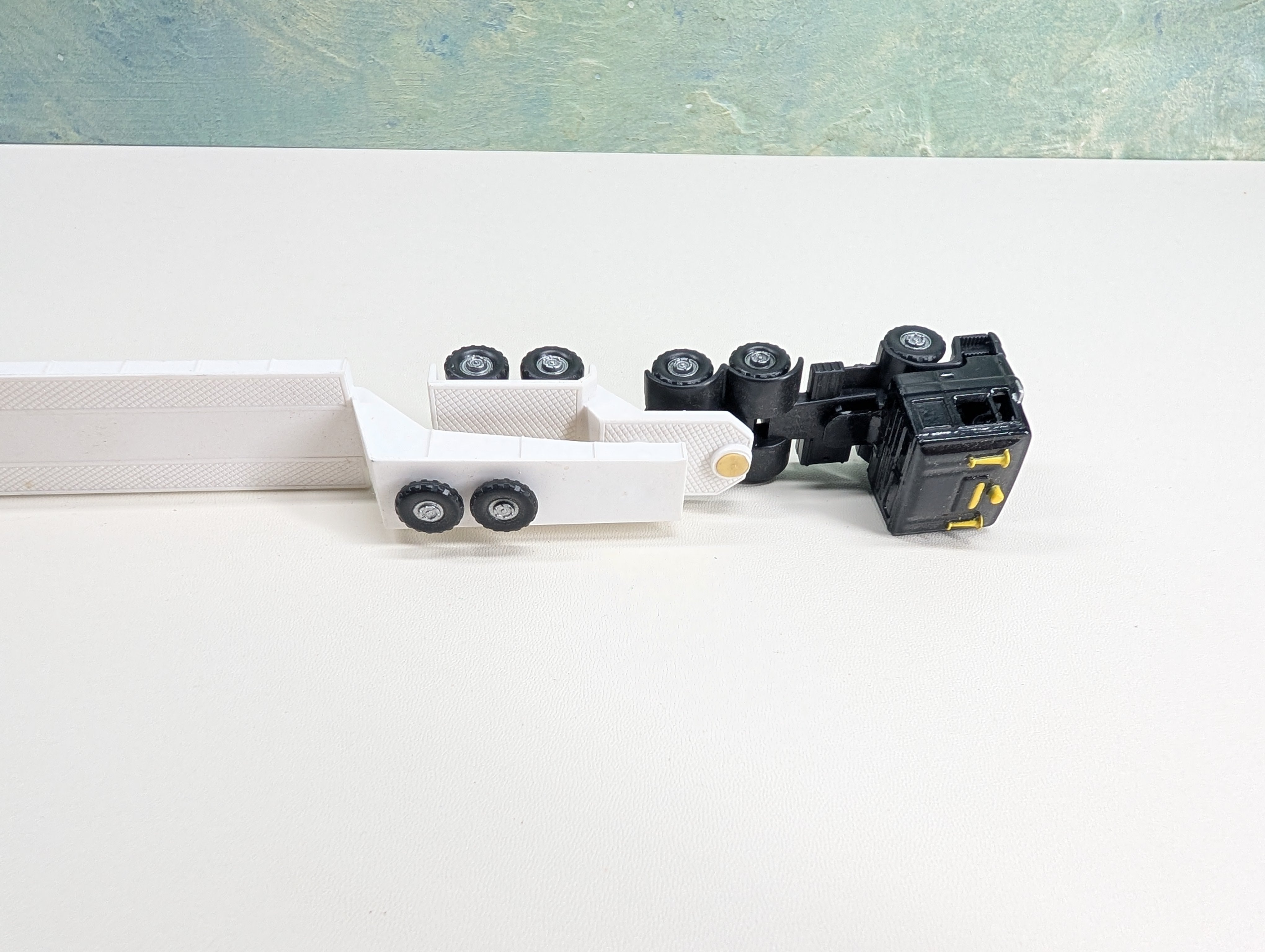 USED HO Scale Black Truck w/ Depressed Flatbed