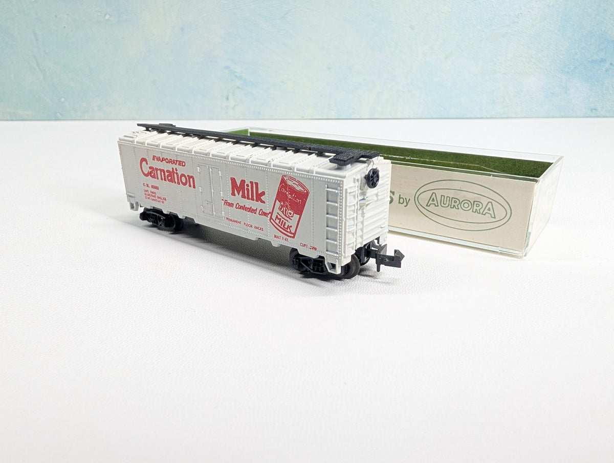 USED Postage Stamp Trains Aurora N Scale Box Car Carnation Milk CM #25063
