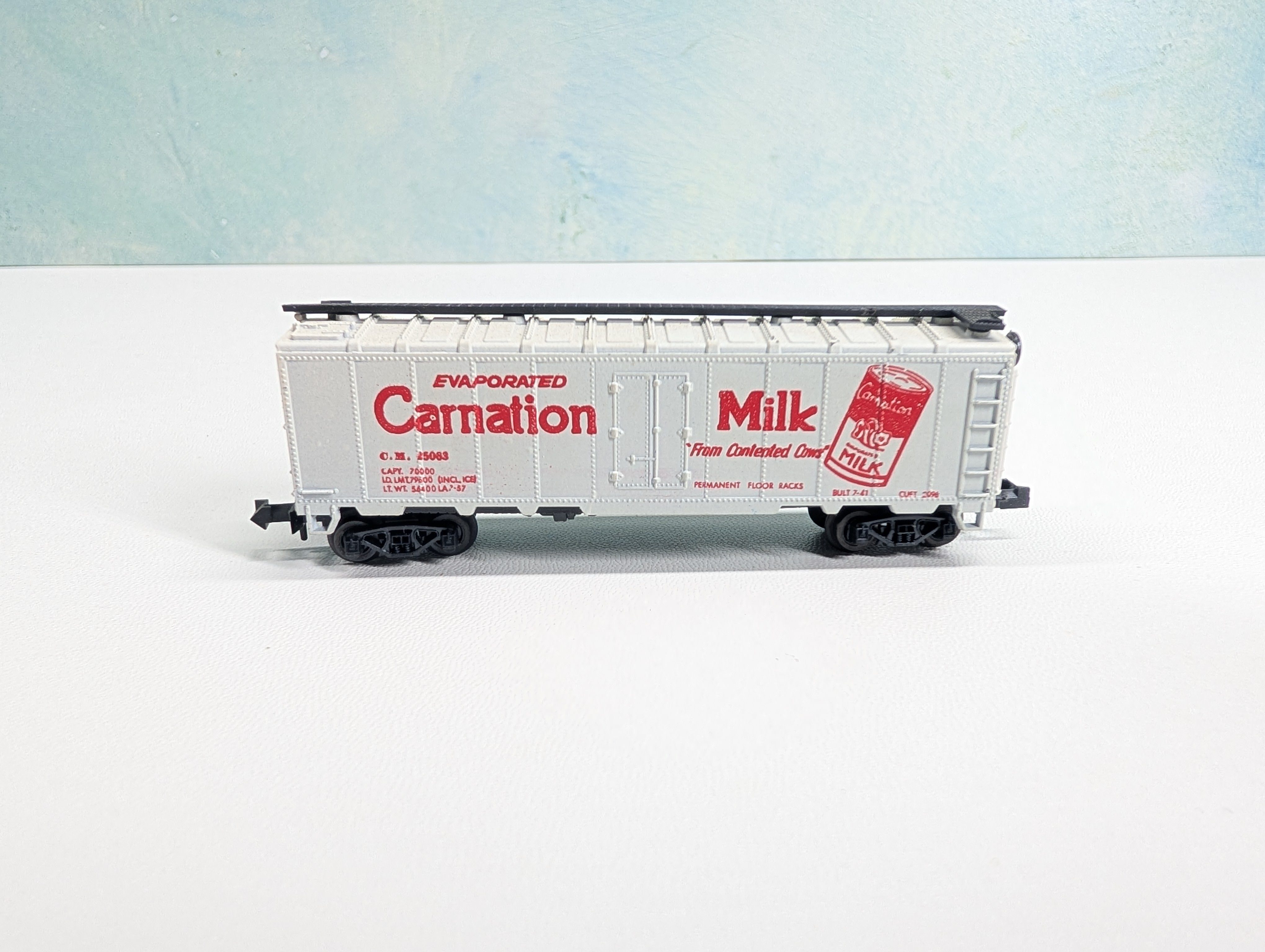 USED Postage Stamp Trains Aurora N Scale Box Car Carnation Milk CM #25063
