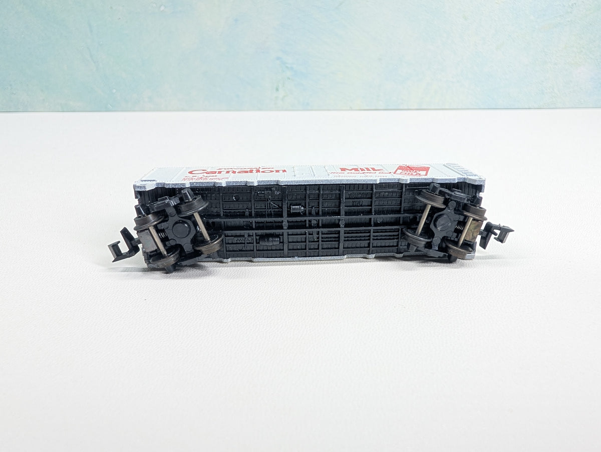 USED Postage Stamp Trains Aurora N Scale Box Car Carnation Milk CM #25063