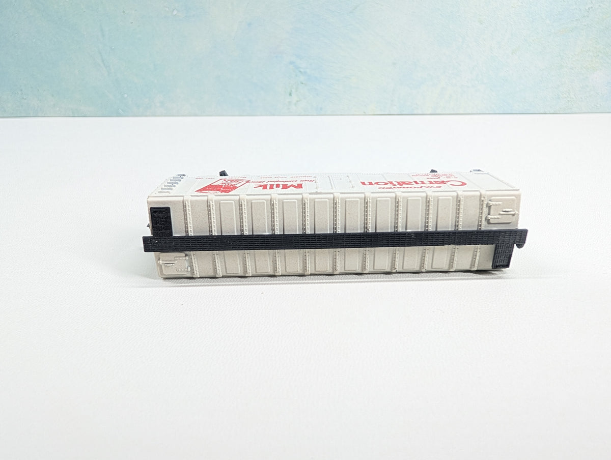 USED Postage Stamp Trains Aurora N Scale Box Car Carnation Milk CM #25063
