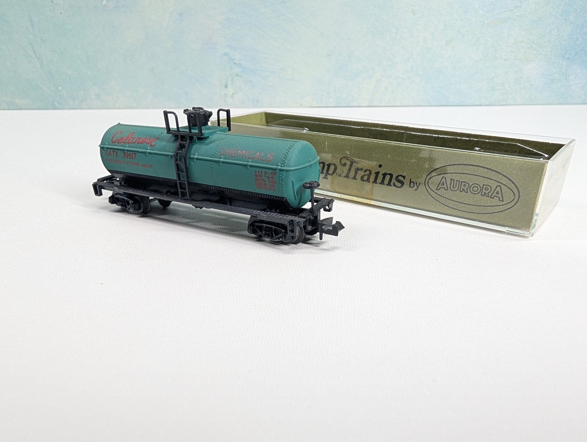 USED Postage Stamp Trains Aurora N Scale Tank Car Celanese Chemicals GATX #39617