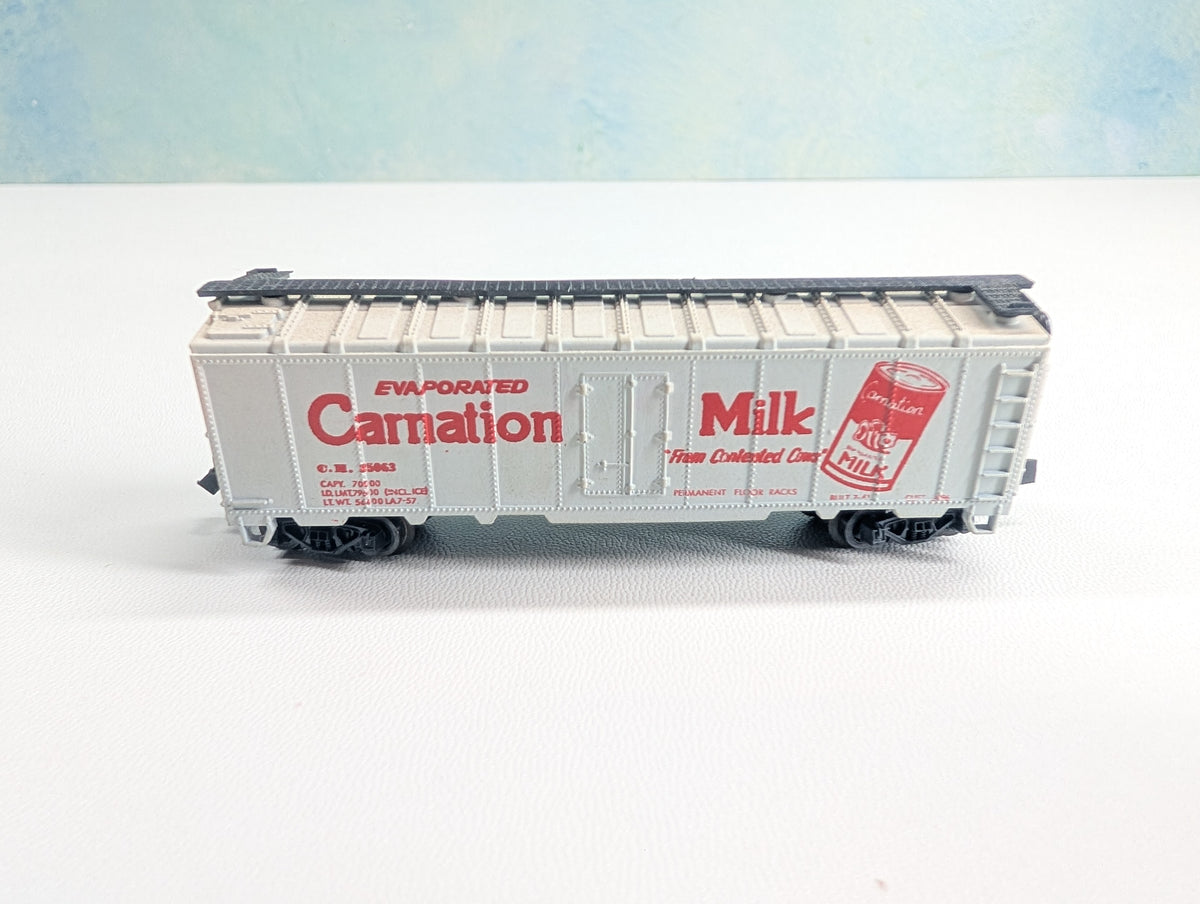 USED Postage Stamp Trains Aurora N Scale Box Car Carnation Milk CM #25063