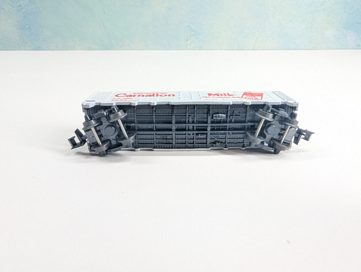 USED Postage Stamp Trains Aurora N Scale Box Car Carnation Milk CM #25063
