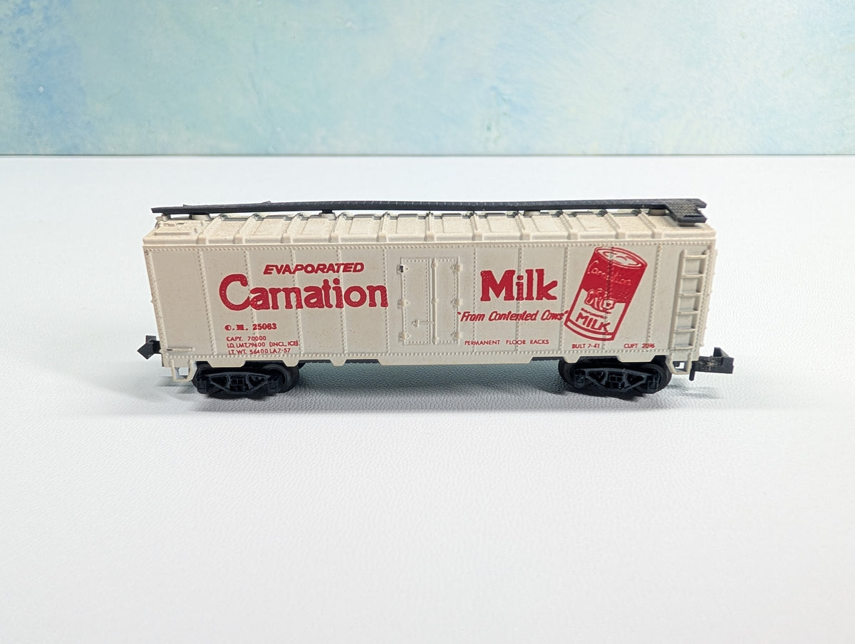 USED Postage Stamp Trains Aurora N Scale Box Car Carnation Milk CM #25063