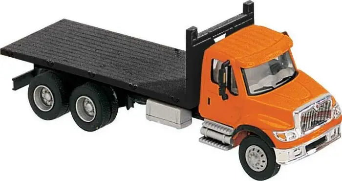 Walthers 949-11651 HO Scale International 7600 3-Axle Flatbed Truck - Assembled Orange Cab, Black Flatbed